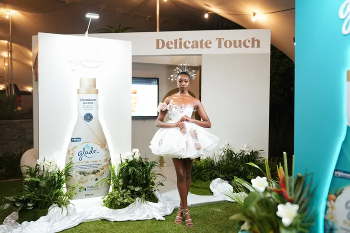 A model in a Delicate Touch look, in a set built around the fragrance